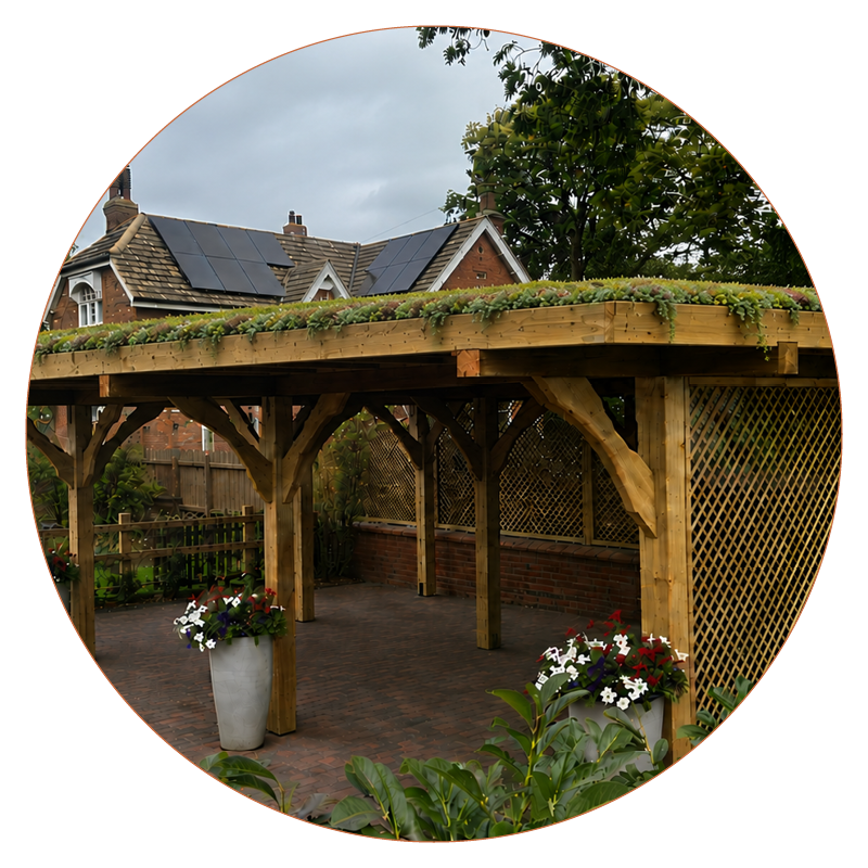 Heritage timber car port with a sedum green roof and trellis side, sheltering a patio with potted flowers